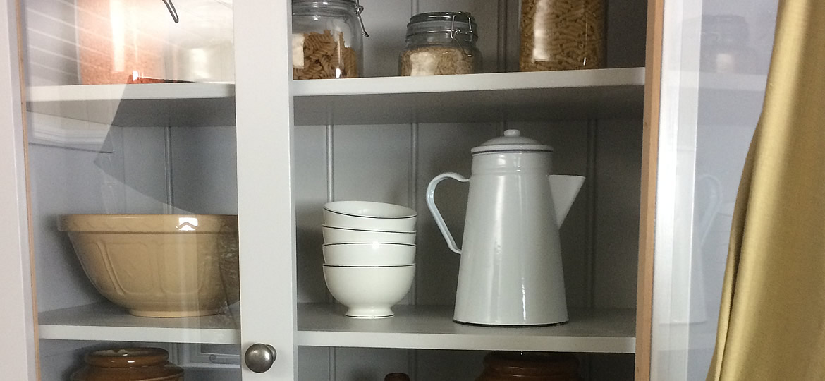 freestanding larder cupboard fitted with fully adjustable shelves
