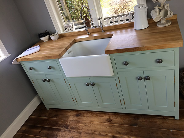 large freestanding belfast sink unit fitted with 40mm thick oak worktop