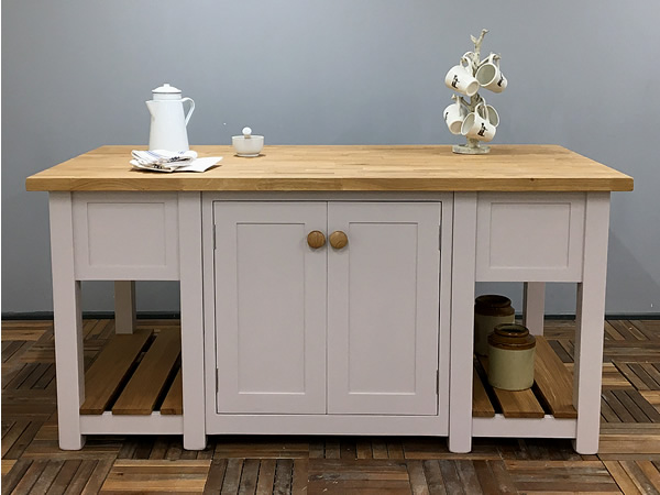 large freestanding kitchen island with oak worktop