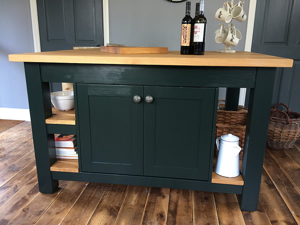 large freestanding kitchen island with double door storage cupboard