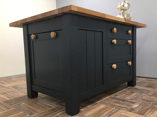 medium freestanding kitchen island with pull out waste bin and drawers